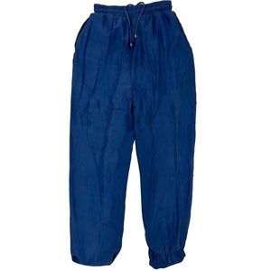 Women’s vintage silk tracksuit pants in a shimmering navy blue by Out Brook.